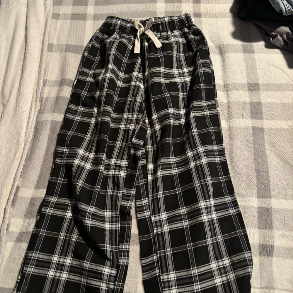 Girls plaid pj pants. Worn once. No stains. Smoke and bug free